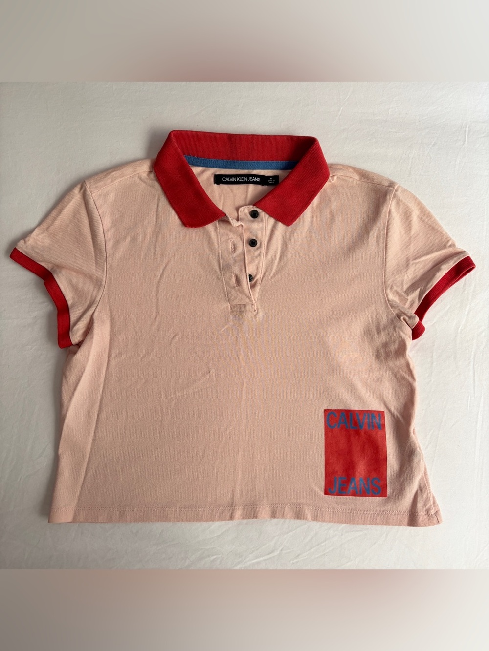 Calvin Klein Jeans Peachy Pink Cropped Polo with Red Collar